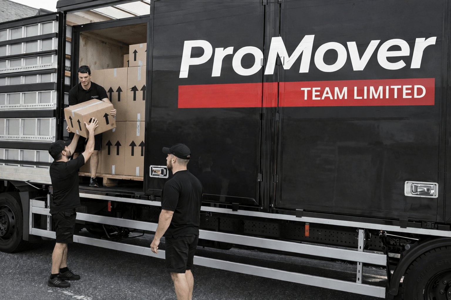 Professional movers in London loading a removal truck as part of a structured full home relocation service